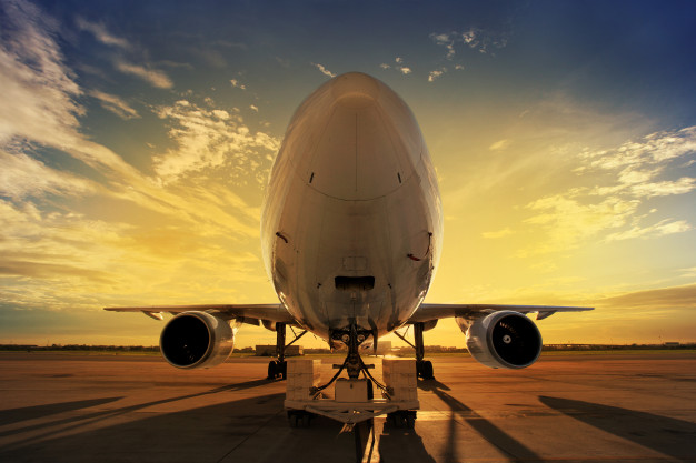 airplane-sunset_1150-8368